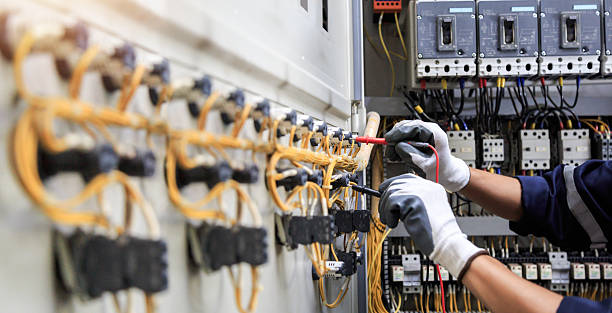 Professional Electrician technician working in Ensley, FL